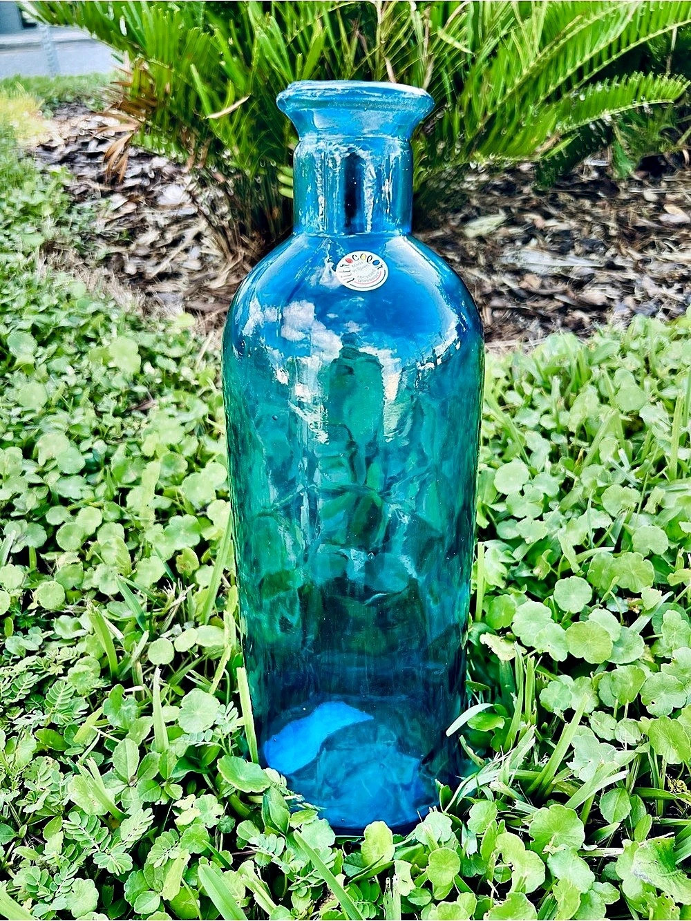 blue recycled glass bottle vase produced by Vitrocolor Spain